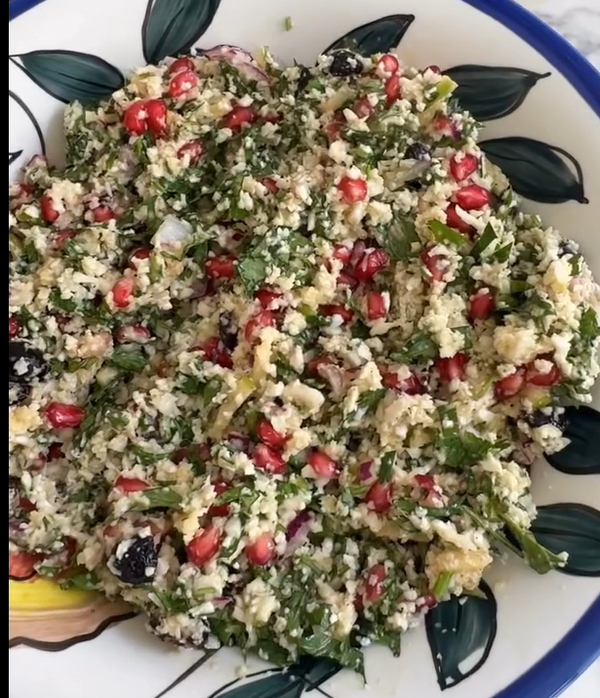 Pour the dressing over the salad right before serving, toss gently to combine, and top with toasted pine nuts or almonds for extra crunch.