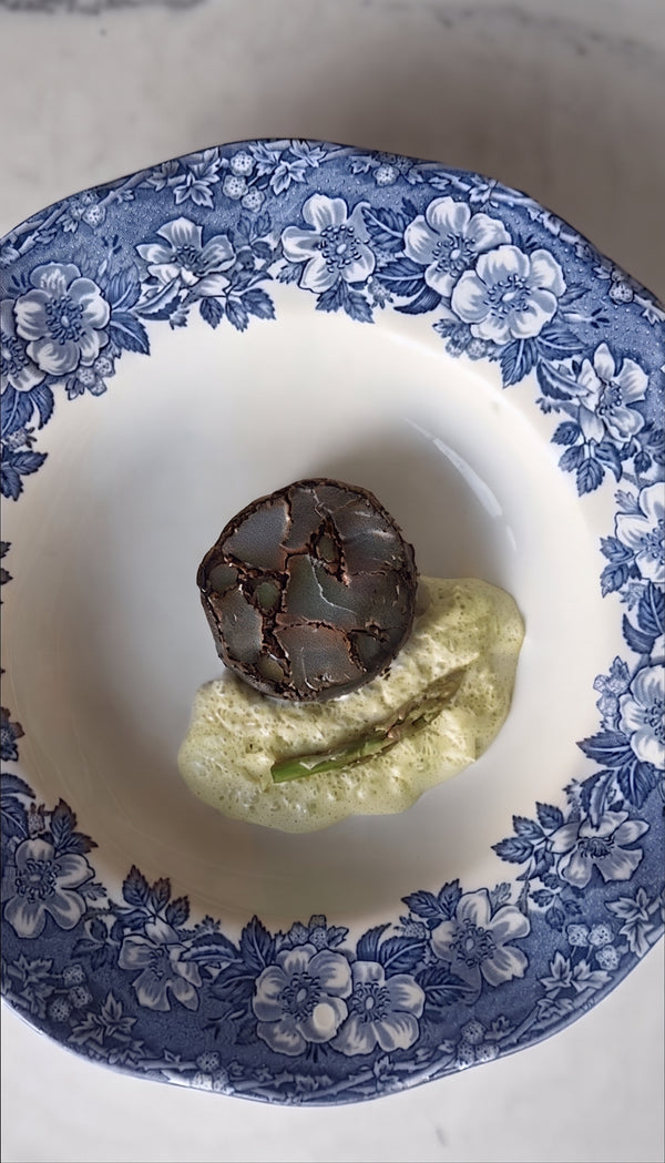 Present the stunning, precise sushi mosaic slices
featuring asparagus wrapped in nori and seasoned white fish, served over a silky green
curry sauce, looking like a million bucks with zero effort.