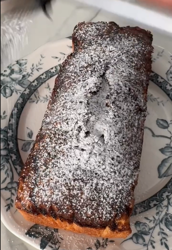 Dust Cake 1 with powdered sugar.
