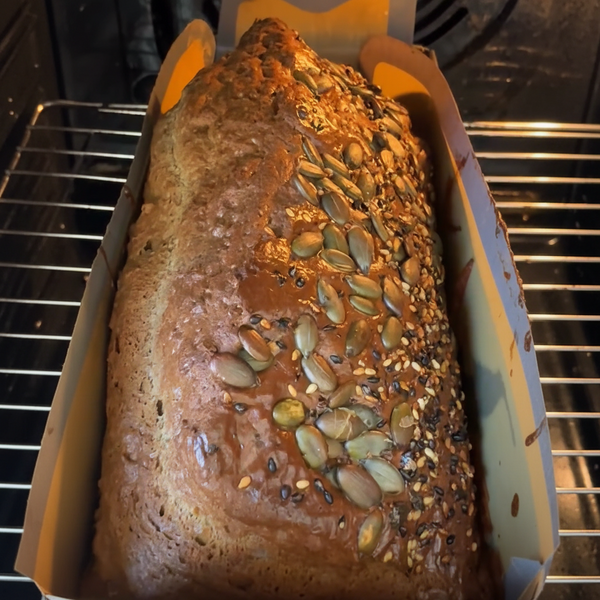 Sprinkle generous amounts of sesame seeds or nigella seeds over the surface.