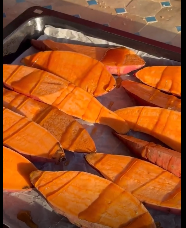 Drizzle with olive oil, coarse salt, and pepper. Roast flesh-side down on parchment paper at 200°C (400°F) for 40–45 minutes until soft and caramelized.
