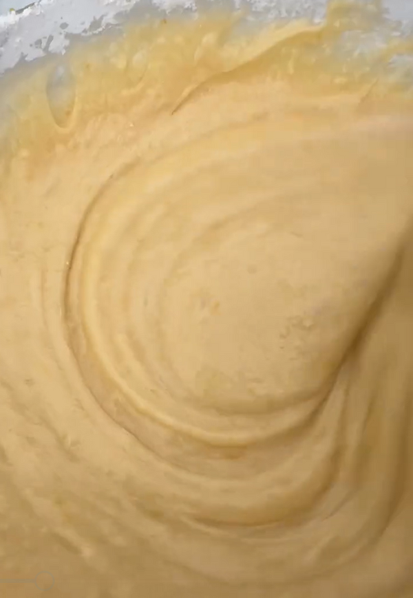 In a large bowl, whisk eggs and sugar until light. Add oil, milk, and vanilla extract.