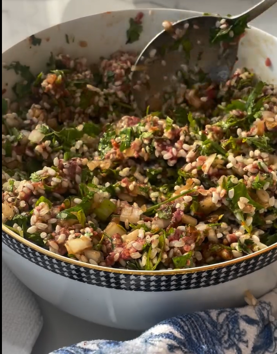 Mix rice, onion, parsley, mint, tomatoes, oil, lemon juice, and spices in a large bowl.