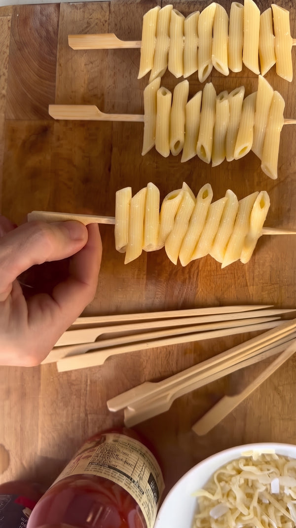 Bake at 180°C for 12–15 minutes until cheeses melt and form a golden crust.