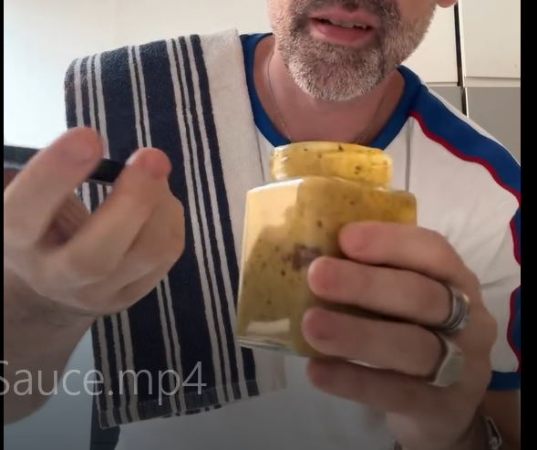Tightly close the jar lid and shake vigorously for 15–20 seconds until the dressing fully emulsifies into a smooth, creamy sauce.