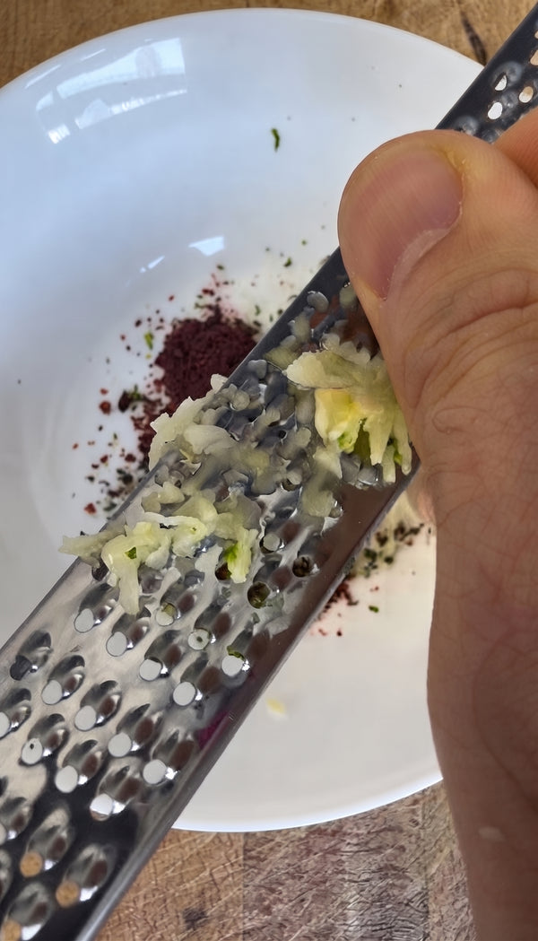 In a bowl, combine minced garlic, red chili, brown
sugar, salt, pepper, sweet chili sauce, soy sauce, fish sauce (optional for vegetarians),
coconut oil, sesame oil, fresh lime juice, lemon zest, and mirin.