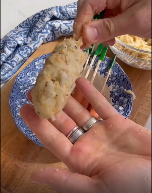 Wrap Hot Dogs: Flatten a small handful of potato mixture, place a hot dog in the middle, and wrap tightly, squeezing firmly.