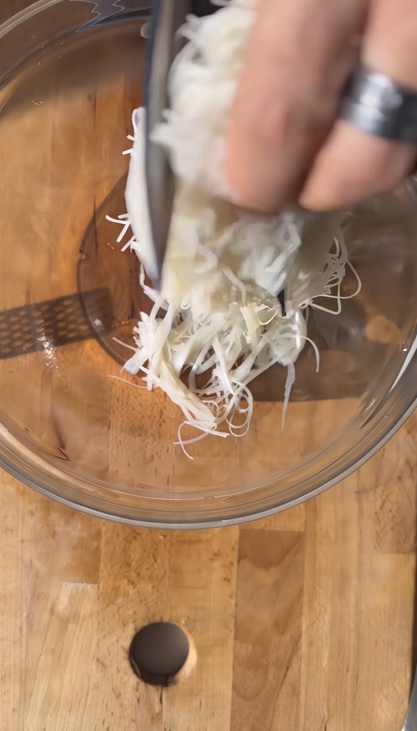 Heat oil to high temperature and fry the semi-dry rice paper eggrolls
quickly until they become insanely crispy and golden.