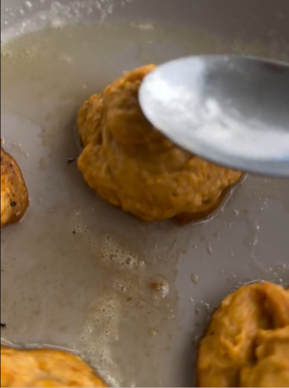 Heat butter in a skillet. Shape latkes using a ring mold and wet spoon. Fry 2–3 minutes per side until deep golden brown.