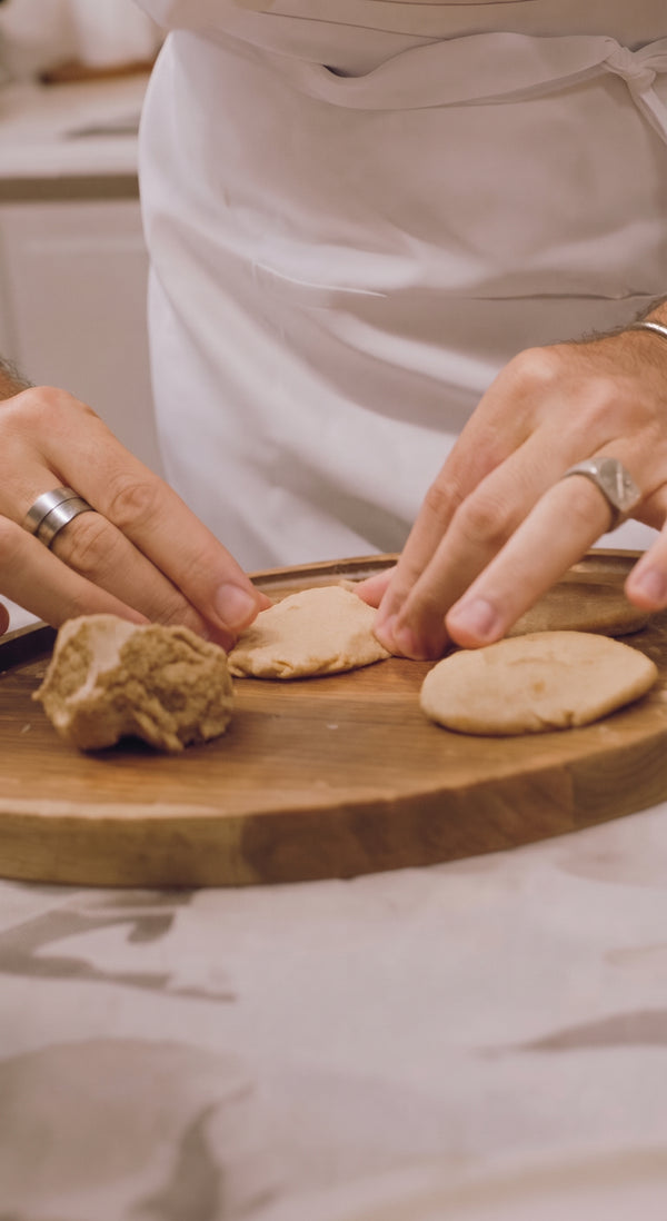 Whisk together raw tahini, goat yogurt, lemon juice,
garlic, salt, pepper, and cold water until smooth. Serve the stuffed peppers hot over the
fresh yogurt-tahini sauce and warm pitas.