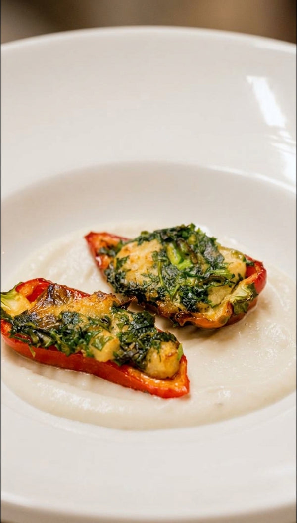 Present the juicy fish kebabs stuffed
tightly inside sweet Tinkerbell peppers, served over Greek yogurt-tahini sauce and paired with homemade spelt pita bread, looking like a million bucks with zero effort.