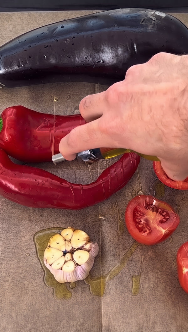Peel off the charred skin of the eggplants and
peppers, and chop the flesh coarsely on a cutting board.