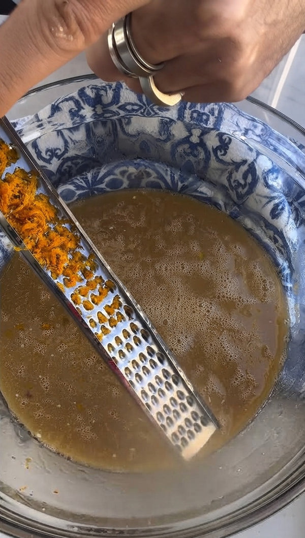 Use a microplane grater to add fresh citrus zest (such as orange zest) directly into the batter mixture.