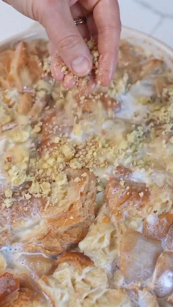 Sprinkle a generous layer of crushed nuts and crumble topping across the top.