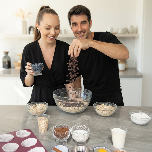Add chocolate chips, blueberries, and dry toppings directly into the large mixing bowl filled with oats.
