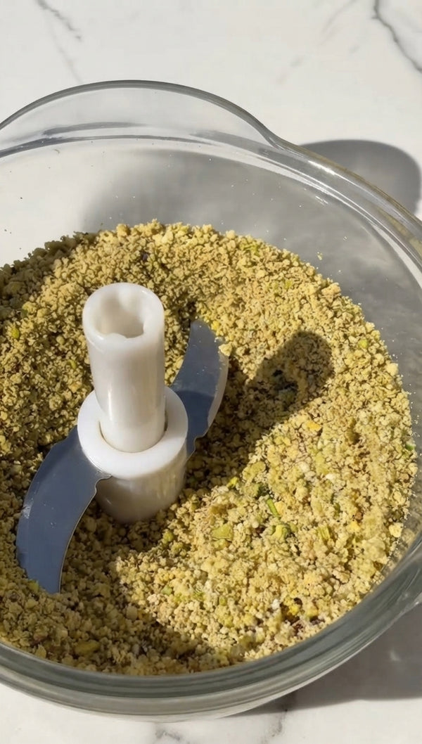 Spread half the cream over biscuits, add another layer of dipped biscuits, and spread remaining cream.