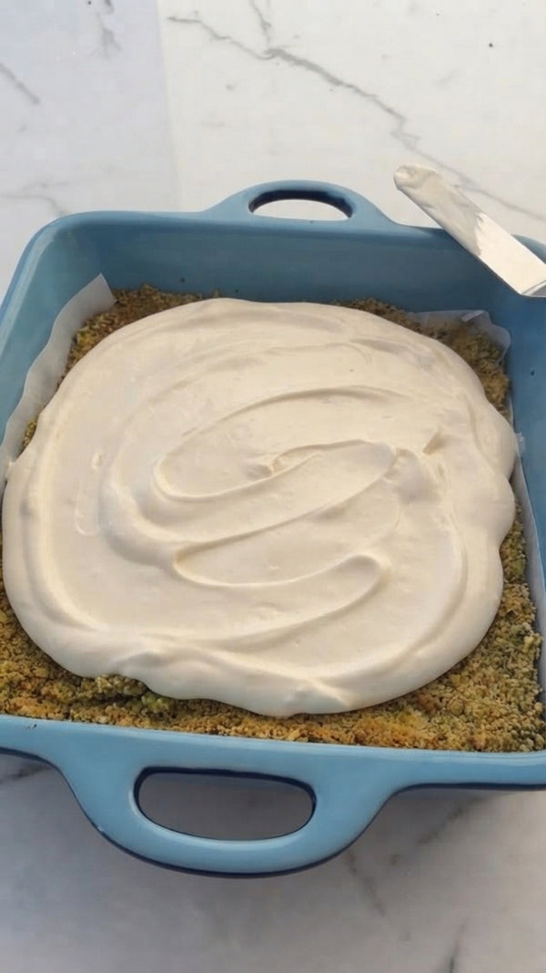 Briefly dip whole biscuits into coffee/milk and arrange a single layer in a pan.