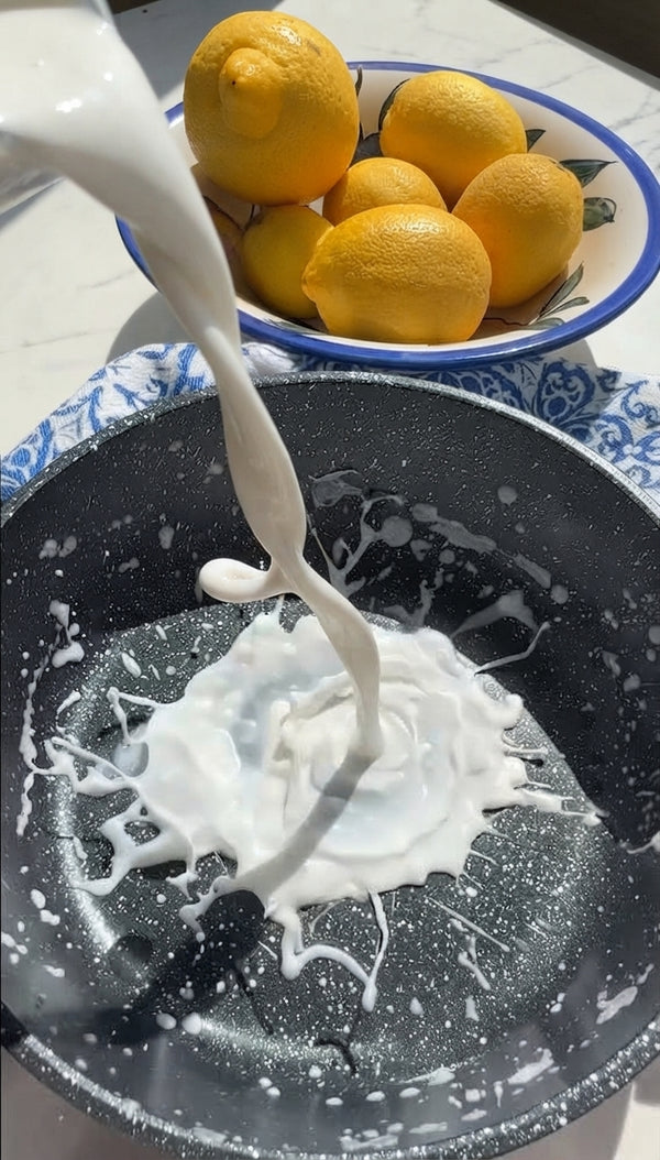 In a large saucepan or skillet off the heat, whisk together coconut milk, cornstarch, and sugar until completely dissolved and free of lumps.