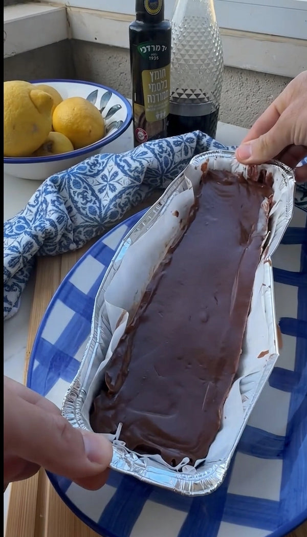 Remove from heat, immediately add chopped dark chocolate, and whisk vigorously until melted, fully incorporated, and shiny.