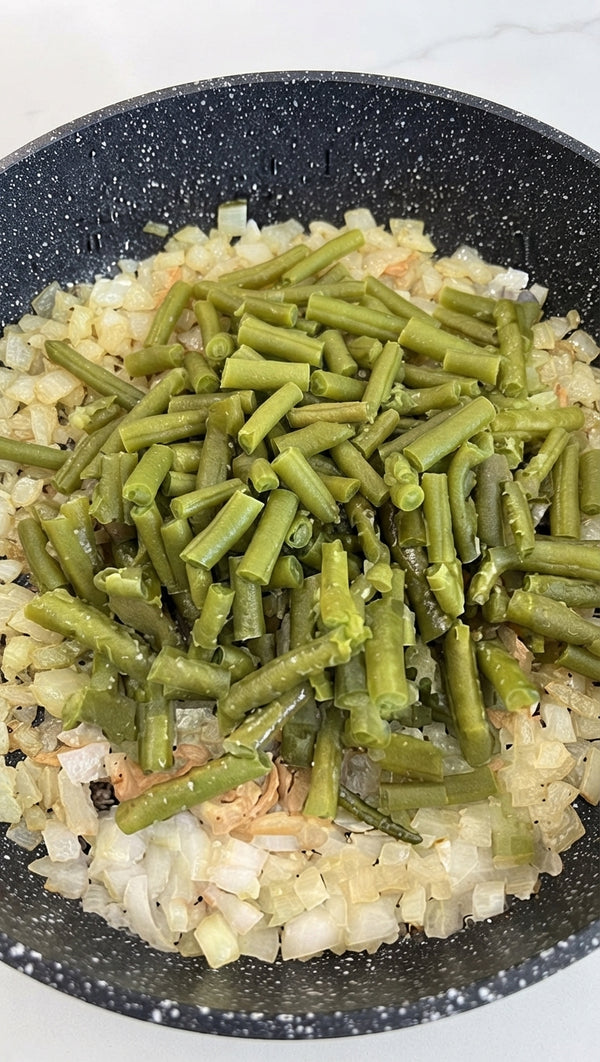 Add the green beans into the pot around the chicken. Cover and cook for another 8-10 minutes until green beans are tender-crisp. Scatter remaining fresh tarragon on top before serving warm directly from the pot!