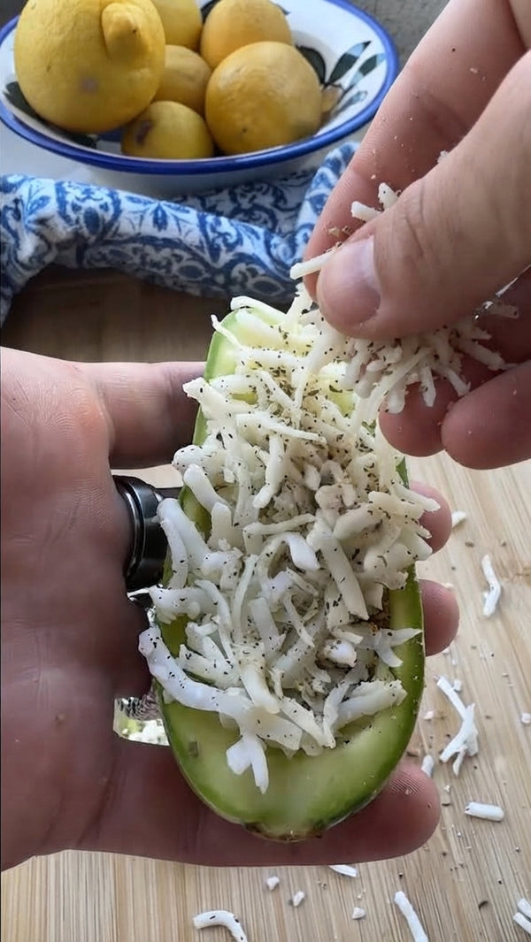 Generously pack each zucchini boat with the cheese and za'atar mixture.