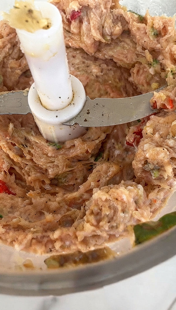Add ground meat and pulse briefly for 10-15 seconds until combined into a smooth paste.