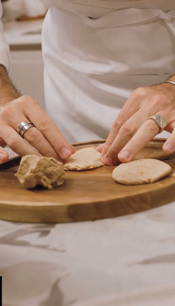 Combine spelt flour, baking powder, and salt in a bowl. Add goat yogurt and olive oil. Knead for 3–4 minutes until pliable and smooth (add teaspoons of water if dry). Cover with a towel and rest for 20 minutes at room temperature.