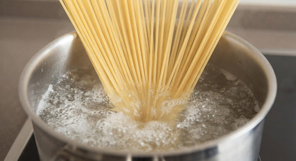 Save starchy pasta water. Cook spaghetti in a pot of generously salted boiling water until al dente. Reserve ½ cup of the starchy pasta cooking water before draining.