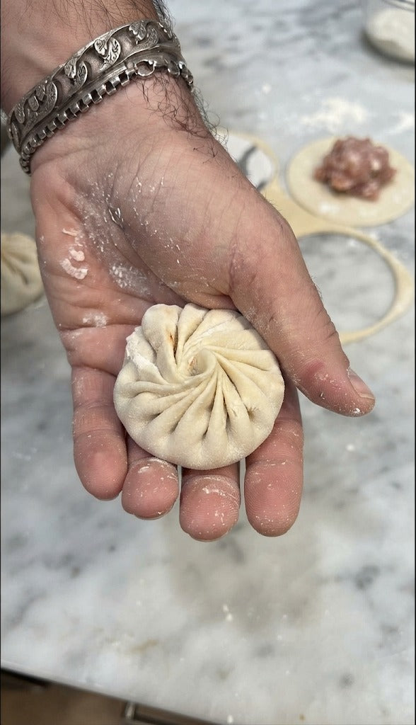Arrange dumplings 2 cm apart in a lined bamboo steamer. Steam over boiling water for 6–8 minutes until dough is translucent and filling is cooked through. (Alternative: Pan- fry in a lightly oiled pan for 2 minutes until bottoms crisp, add water to ⅓ height, cover, and steam until cooked). Serve hot!