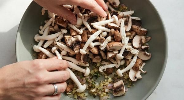 Heat oil in a pan, sauté mushrooms until golden. Add soy sauce, sesame oil, garlic powder, ginger, and chili flakes. Cook for 2-3 minutes until savory glaze forms. Set aside.