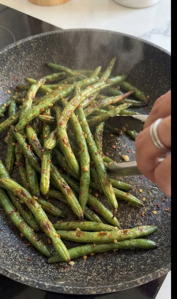 Boil in salted water for 2 minutes, then immediately shock in ice water. Drain completely.