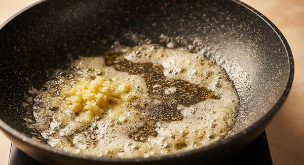 Heat olive oil in a wide skillet or wok over high heat. Add the green beans and stir-fry vigorously for 3-4 minutes until blistered and slightly charred on the outside while remaining tender-crisp inside.