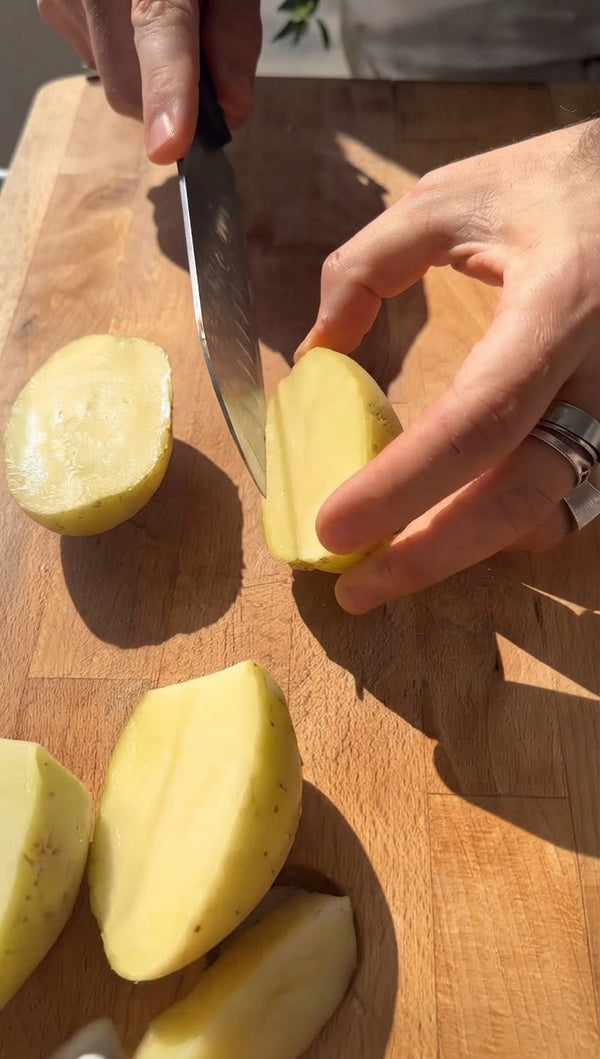 Cut potatoes and sweet potatoes into uniform wedges. For maximum interior fluffiness, boil potato wedges in salted water for 5-7 minutes, then drain well and air-dry.