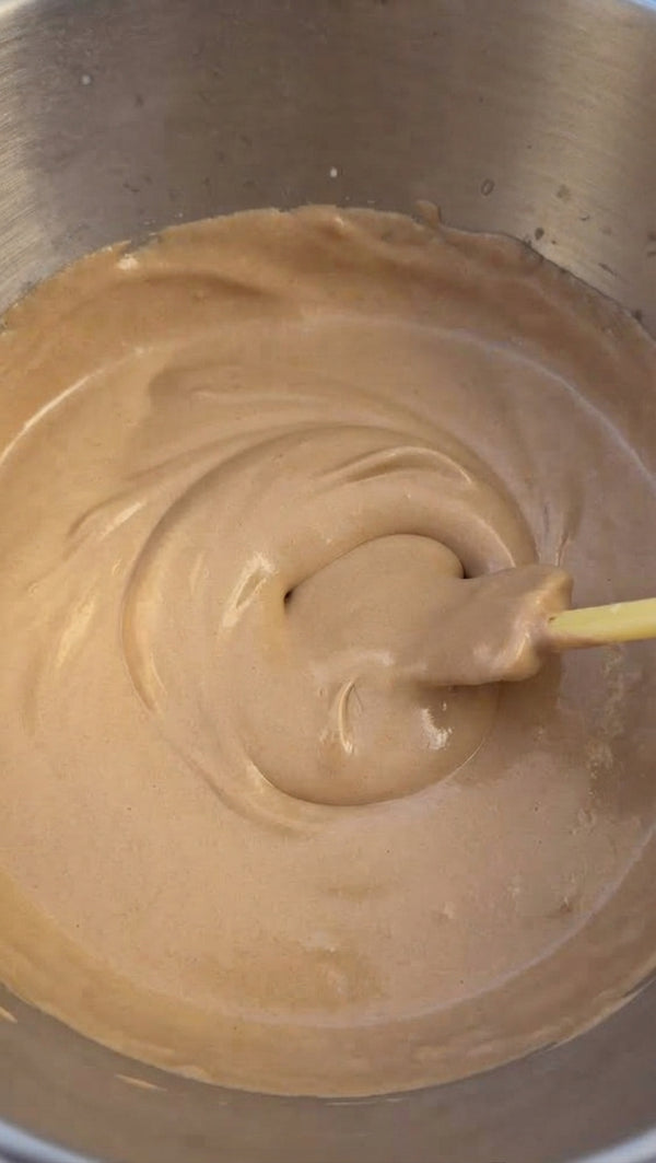 Whip heavy cream, mascarpone, instant vanilla pudding, and 1/2 cup milk until thick and velvety.