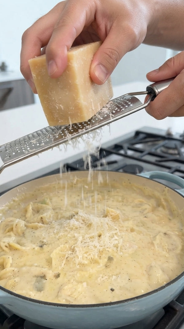 Creates a glossy pan coat. Melt butter in a pan with minced garlic, chopped za'atar, 1 tbsp roasted pumpkin puree, cream, and grated Parmesan. Whisk continuously until a smooth, glossy emulsion forms.