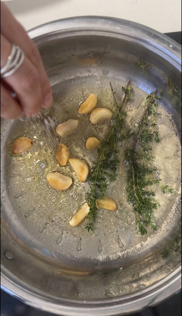 Heat chicken stock, submerge secret infusion bag for 5 minutes, then remove bag and keep stock warm.