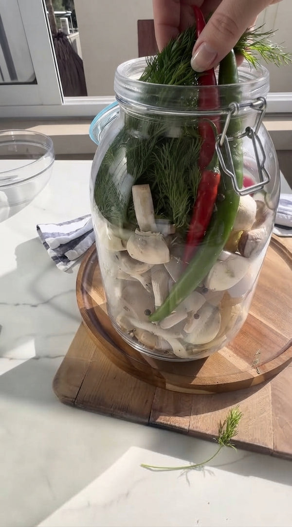 Dissolve sea salt in filtered water. Stir in soy sauce, rice vinegar, ginger, garlic, and sliced red chili.