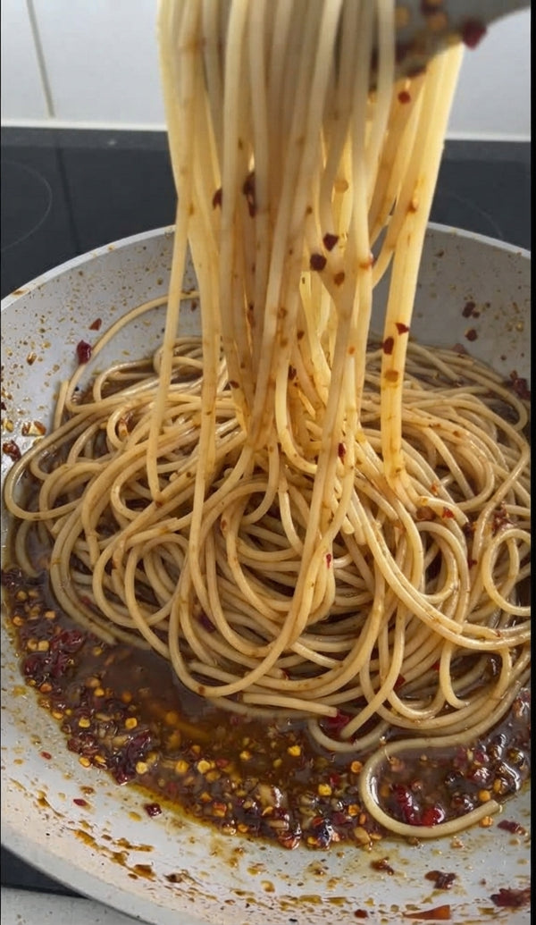 Whisk in white miso paste and coconut cream (or heavy cream) until smooth and glossy.