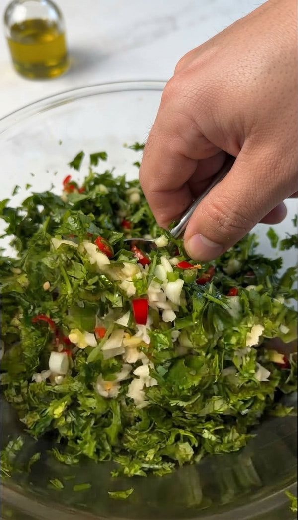 Chop green onions, slice garlic, mince ginger, and slice Thai chili if using.