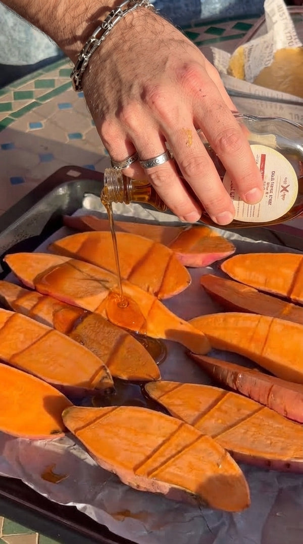 Drizzle with olive oil, coarse salt, and pepper. Roast flesh-side down on parchment paper at 200°C (400°F) for 40–45 minutes until soft and caramelized.