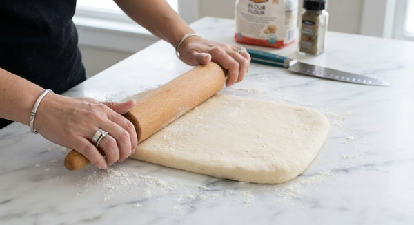 Cover with plastic wrap and a towel. Let rise in a warm place for 5–6 hours until doubled in size, or proof in the refrigerator overnight (minimum 9 hours). Bring dough back to room temperature before shaping.