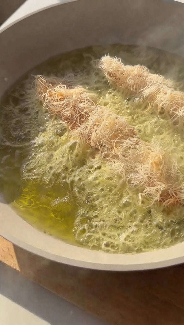Heat deep oil in a wide pot or pan over medium-high heat. Fry kadaif- wrapped chicken tenders for about 3 minutes per side until deep golden brown, watching closely so the pastry does not burn. Transfer to paper towels to drain.
