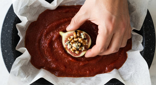 Gently peel away individual softened onion layers. Place a heaped tablespoon of the bulgur filling inside each layer and roll tightly. Arrange stuffed onions snugly, seam-side down, in a wide ovenproof pot or baking dish.