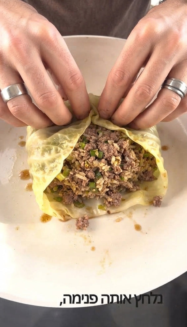 Generously pack the meat filling between the cabbage leaf pockets, flattening slightly so the meat cooks evenly.