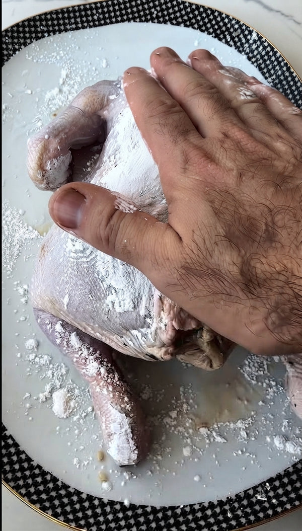 Rub marinade all over the chicken and inside the cavity. Pack the cavity tightly with the parcooked rice mixture. Tie chicken legs with kitchen twine.