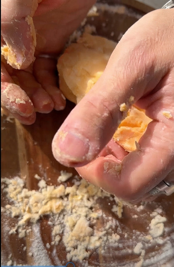 Place flour in stand mixer bowl. Add eggs, olive oil, and salt. Knead using the mixer until combined, then briefly hand-knead with a dusting of flour until a smooth, firm, and elastic dough forms.
