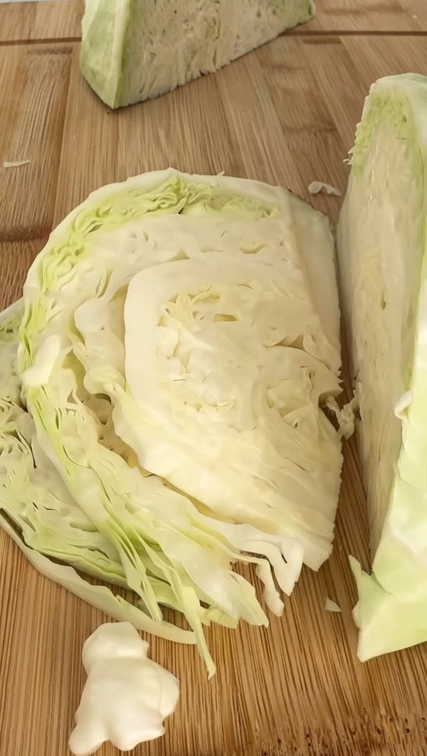 Add olive oil or butter to the pan along with sliced cabbage ribbons. Sauté for 5-7 minutes until soft, glossy, and slightly translucent like cooked tagliatelle noodles.