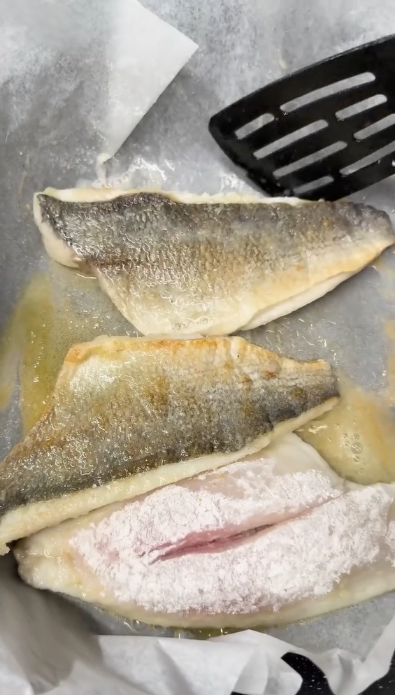 Pat fish skin dry. Heat oil in skillet and cook skin-side down for 3–4 minutes until crisp, flip for 1–2 minutes.