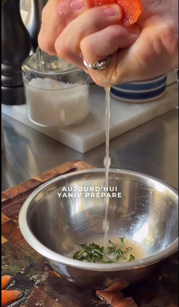 In a bowl, mix 1 tbsp olive oil, blood orange juice, salt, Urfa pepper, and finely crushed kaffir lime leaves until emulsified.