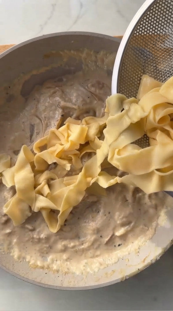 Wrap pasta dough tightly in plastic wrap and allow to rest in the refrigerator for 30 minutes.